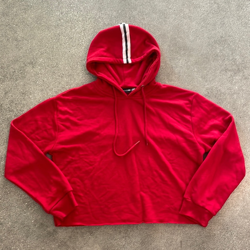 Pretty little thing cropped red sweatershirt with stripe detail on hood.